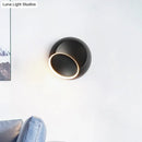 GobekUsa Modern Black/White Rotating Eclipse Wall Lamp with LED Iron Sconce Design