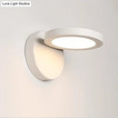 GobekUsa Acrylic Rotating Lens Wall Light: Simplicity in White/Black with Warm/White LED Glow