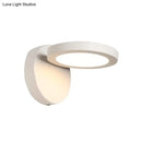 GobekUsa Acrylic Rotating Lens Wall Light: Simplicity in White/Black with Warm/White LED Glow