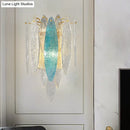 GobekUsa Stylish Blue/Clear Seedy Glass 2-Light Oval Flake Wall Sconce Lamp