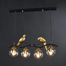 GobekUsa Modern Branch Island Pendant Light with Ball Glass Shade and Bird Deco - Metal 4-Light Fixture for Dining Room
