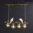 GobekUsa Modern Branch Island Pendant Light with Ball Glass Shade and Bird Deco - Metal 4-Light Fixture for Dining Room