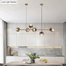 GobekUsa Minimalist Brass Ball Island Lamp: 6-Bulb Suspension Light with Glass Shade - Perfect for Restaurants