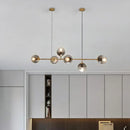 GobekUsa Minimalist Brass Ball Island Lamp: 6-Bulb Suspension Light with Glass Shade - Perfect for Restaurants