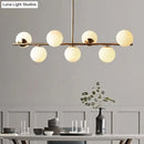 GobekUsa Sleek Cream Glass Spherical Dining Room Pendant Light with 7 Gold Heads - Postmodern Island Lamp