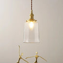 Modern brass and clear glass led pendant lamp for dining room by Decorbites