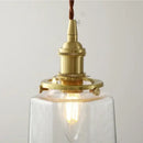 Modern brass and clear glass led pendant lamp for dining room by Decorbites
