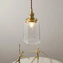 Modern brass and clear glass led pendant lamp for dining room by Decorbites