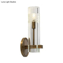 GobekUsa Modern Clear Glass Sconce with Brass Metal Arm and 1 Bulb Wall Light Fixture