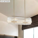 GobekUsa 12-Light Brass Crystal Rod Island Chandelier for Modern Dining Room