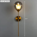 GobekUsa Nordic Glass Wall Light: Ball Shaped Sconce with Brass Pencil Arm