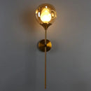 GobekUsa Nordic Glass Wall Light: Ball Shaped Sconce with Brass Pencil Arm