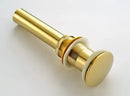 Modern brass and white ceramic basin waste drain bathroom sink stopper by Decorbites