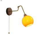 Modern brass and wood wall sconce amber led bathroom light by Decorbites