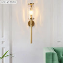 GobekUsa Brass Modernist Cylinder Sconce Light Fixture with Clear Water Glass - Corner Wall Lamp (1 Light)