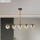 GobekUsa Modern Brass Pendant Light with 5 Cognac Glass Shades - Linear Dining Room Island Lamp