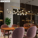 GobekUsa 27-Bulb Island Light Brass Finish Hanging Lamp with Glass Shade - Minimalist Branch Design