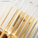GobekUsa Clear Crystal Half-Cylindrical Wall Sconce Lamp: Contemporary Brass Finish Lighting for Bedroom