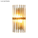 GobekUsa Clear Crystal Half-Cylindrical Wall Sconce Lamp: Contemporary Brass Finish Lighting for Bedroom