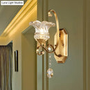 GobekUsa Modern Clear Glass Flower Sconce: Brass Wall Lamp with Crystal Accent - 1/2 Lights