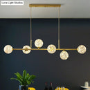 GobekUsa 6-Light Linear Dining Room Island Pendant with Postmodern Metallic Finish and Glass Ball Shades