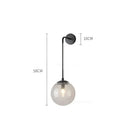 Modern brass glass ball wall lamp bedroom amber globe lighting by Decorbites