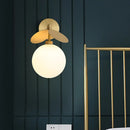 GobekUsa Modern Globe/Oval Wall Mount Lamp with Cream Glass - Brass Bedside Wall Light with Leaf Deco