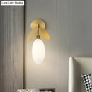 GobekUsa Modern Globe/Oval Wall Mount Lamp with Cream Glass - Brass Bedside Wall Light with Leaf Deco