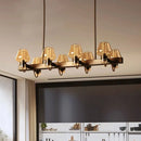 GobekUsa Modernist Clear/Amber/Smoke Glass Pendant Lamp with Linear Design - Cone Island Lighting (6/8 Lights, Black/Brass Ceiling)