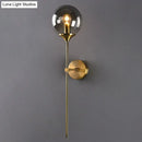GobekUsa Modern Glass Wall Mount Lamp: Sleek Brass Sconce Light with Pencil Arm