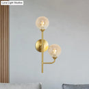 GobekUsa Amber/Smoke Gray Glass 2-Head LED Wall Sconce - Sphere Bathroom Wall Mount Light with Brass Finish