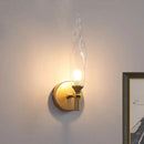 GobekUsa Modern Brass Torch Sconce: LED Wall Mount Lamp with Clear Glass - Bedside Lighting