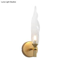 GobekUsa Modern Brass Torch Sconce: LED Wall Mount Lamp with Clear Glass - Bedside Lighting