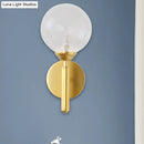 GobekUsa Modern Brass Wall Sconce Light - Clear Glass Sphere for Bedroom