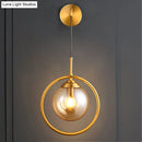 GobekUsa Modern Brass Wall Sconce with Glass Sphere Shade for Bedside Lighting