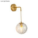 GobekUsa Brass Bedside Wall Sconce Light with Water Glass Shade - Simplicity at Its Finest!