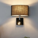 GobekUsa Modern Oval Black Fabric LED Wall Sconce Light for Bedside