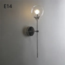 Modern chrome and amber glass ball wall lamps living room lighting by Decorbites