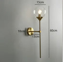 Modern chrome and amber glass ball wall lamps living room lighting by Decorbites