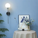 Modern chrome and amber glass ball wall lamps living room lighting by Decorbites