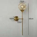 Modern chrome and amber glass ball wall lamps living room lighting by Decorbites