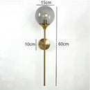 Modern chrome and amber glass ball wall lamps living room lighting by Decorbites