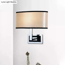 GobekUsa Modern Oval Wall Sconce: Chrome LED Fabric Lighting for Bedside
