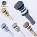 Modern chrome and gold pop up drain bathroom sink stopper by Decorbites