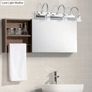 GobekUsa Modernist Crystal Vanity Wall Sconce with Gooseneck Arm - Clear Cylinder Shape, 3 Lights, 12.5"/18" W, Chrome