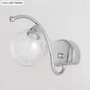 GobekUsa Modern Clear Glass Wall Lamp with LED Light in Chrome - Bedroom Sconce with Curved Arm
