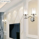 GobekUsa Modern Chrome Dual Cylinder Wall Mount Sconce with Curvy Arm - Simple Bathroom Lighting
