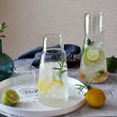 Modern clear glass bedside water carafe set with cup for bedroom by Decorbites