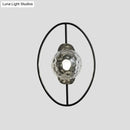 GobekUsa Modern Clear Glass Orb Sconce Lamp - 1-Bulb Black/Gold Wall Light with Ring Detail