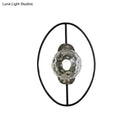 GobekUsa Modern Clear Glass Orb Sconce Lamp - 1-Bulb Black/Gold Wall Light with Ring Detail